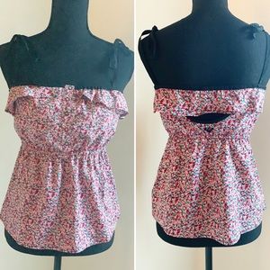 Roxy tie tank with cut out back. Size small.